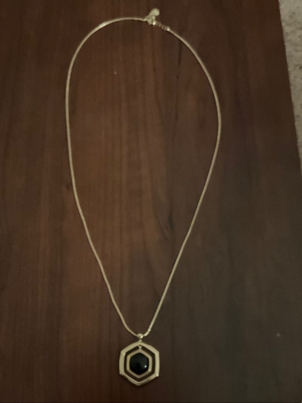 Gold Hexagon Pendant Necklace with Black Center